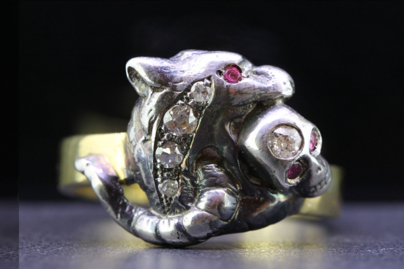 Stunning griffin and skull silver and 18 carat gold ring