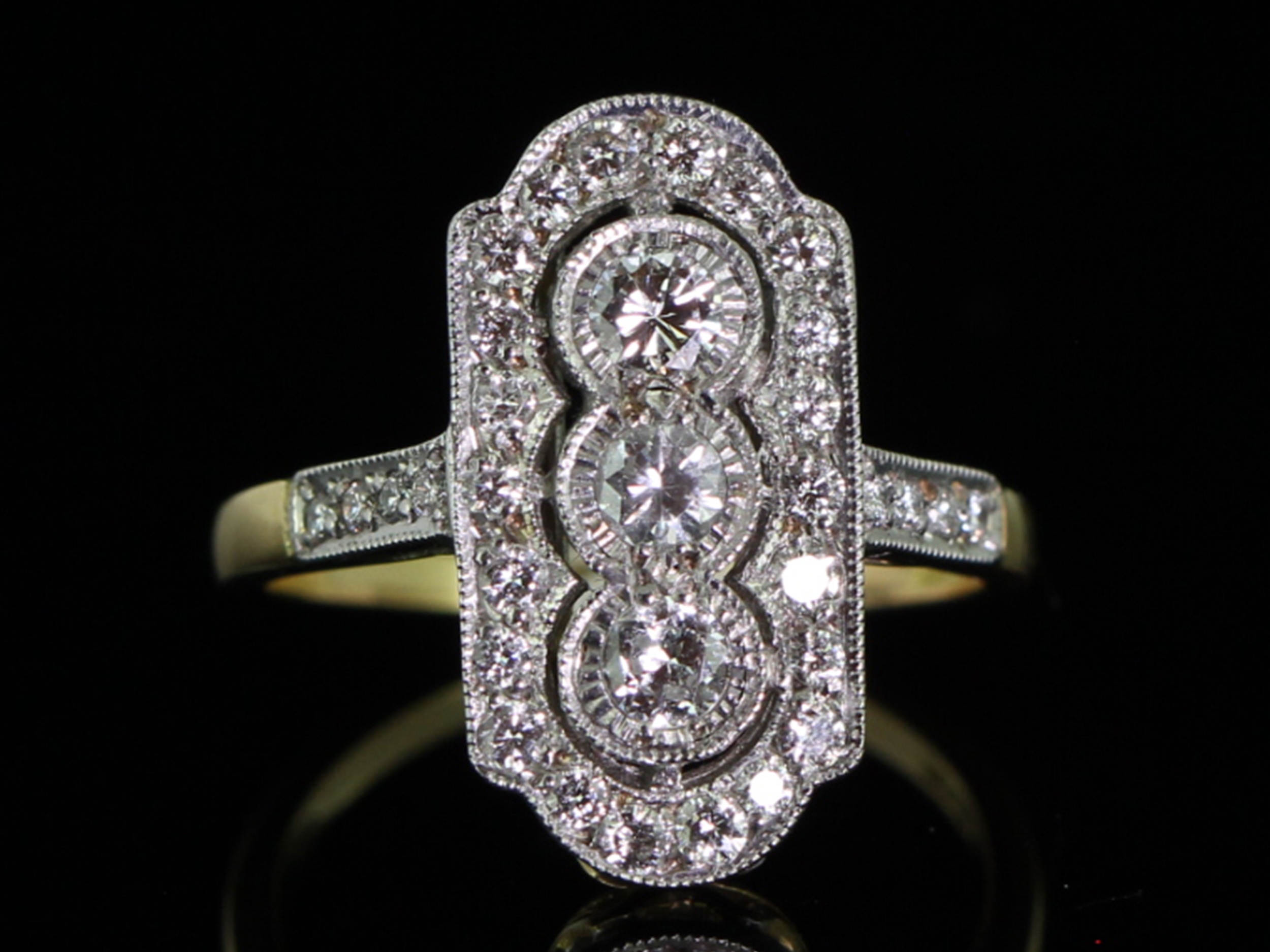 Stunning 18 carat gold diamond plaque ring