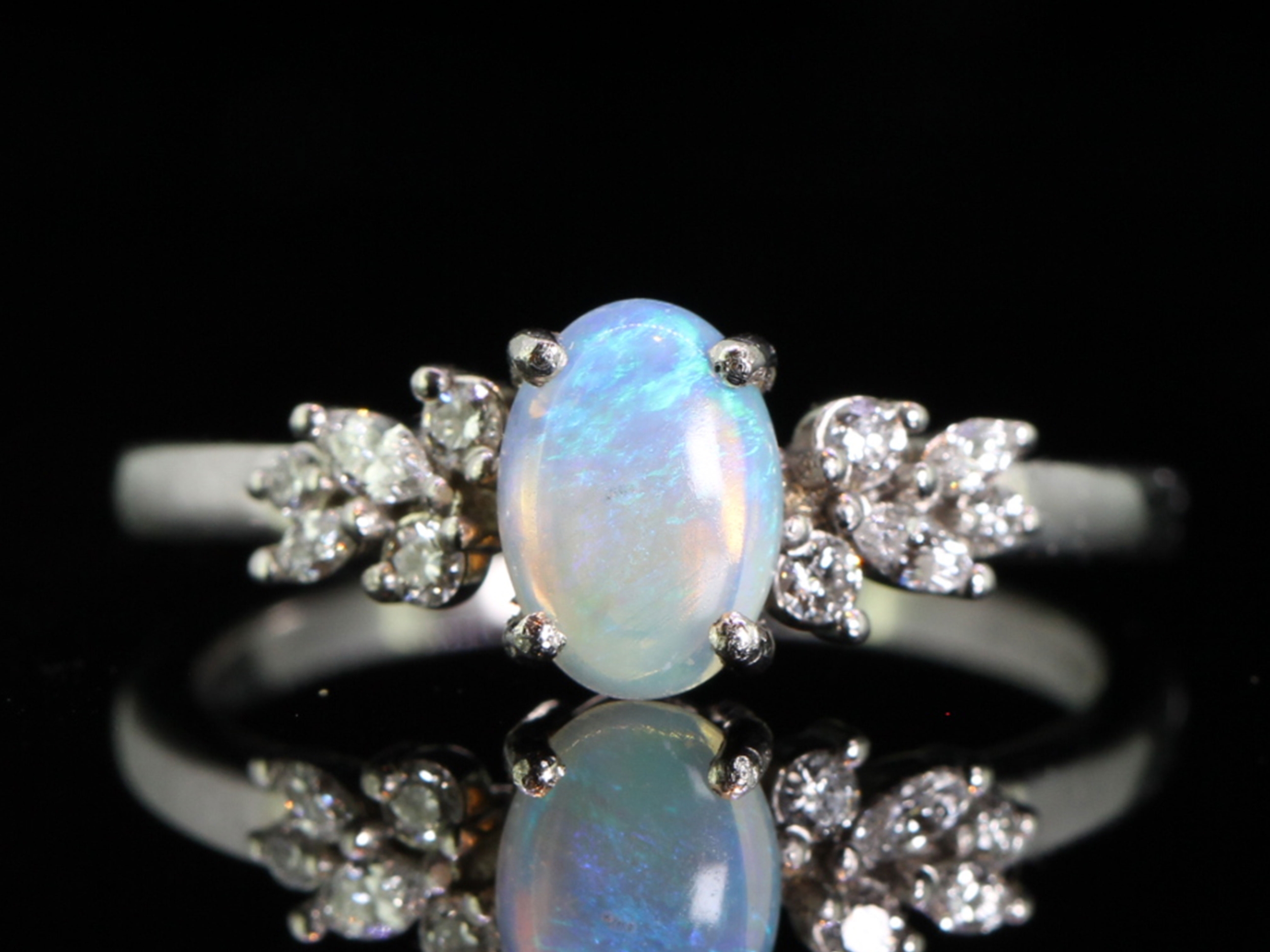 Exquisite  opal and diamond platinum ring