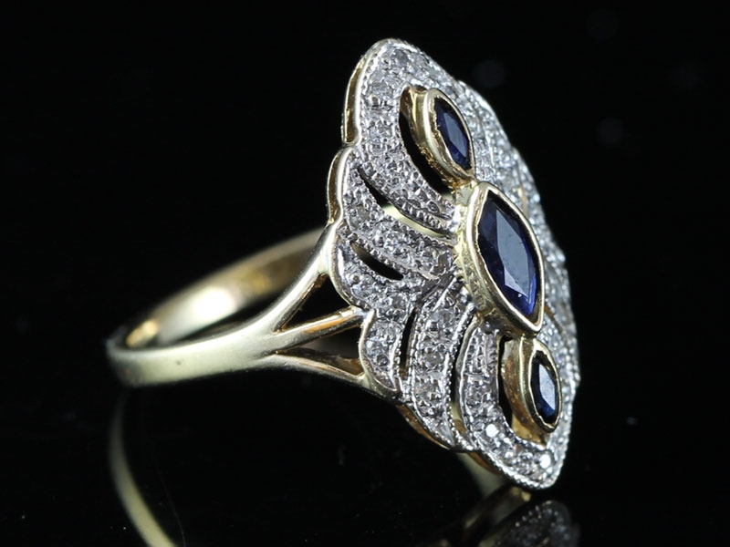 		 beautiful nevette shaped sapphire and diamond 9 carat gold cluster ring		