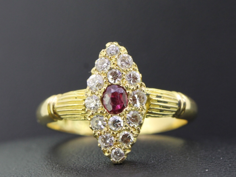 Beautiful ruby and diamond navette 18 carat gold ring