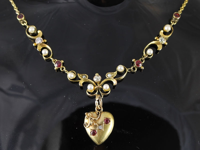 Stunning edwardian ruby, diamond, and pearl heart necklace/pendant in 15 carat gold