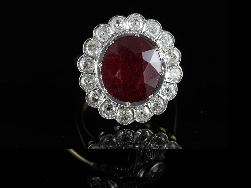 Spectacular 4ct ruby and 2ct diamond cluster ring set in 18ct gold 