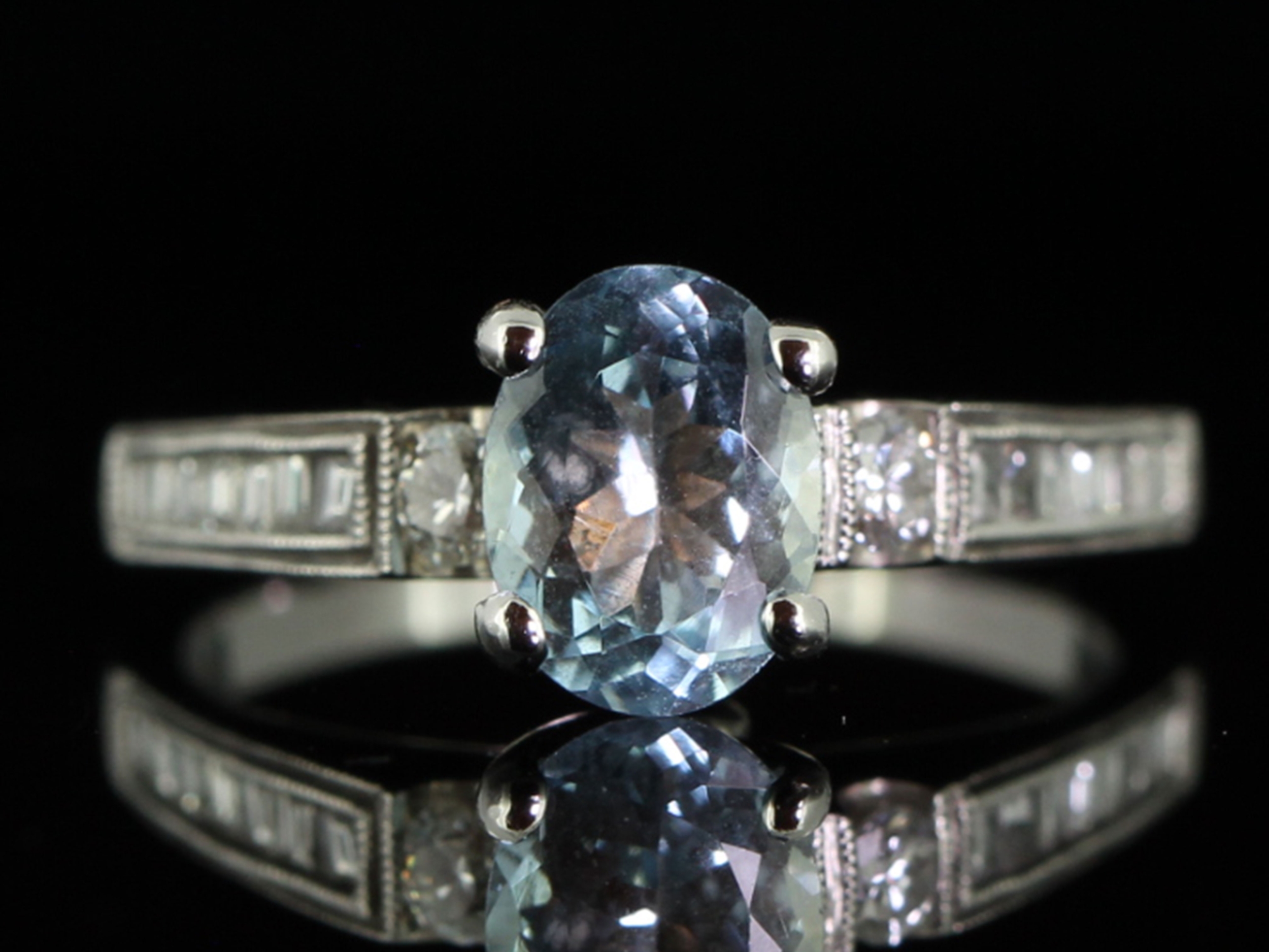 Impressive oval aquamarine and diamond 18 carat white gold ring