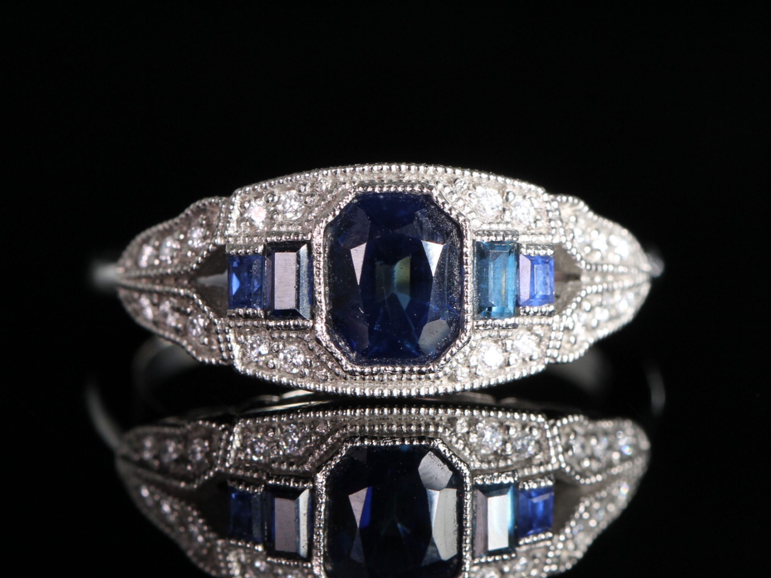 Art deco style sapphire and diamond platinum ring