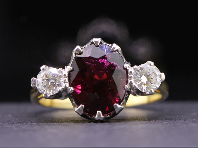 Elegant rubellite and diamond trilogy 18 carat gold ring