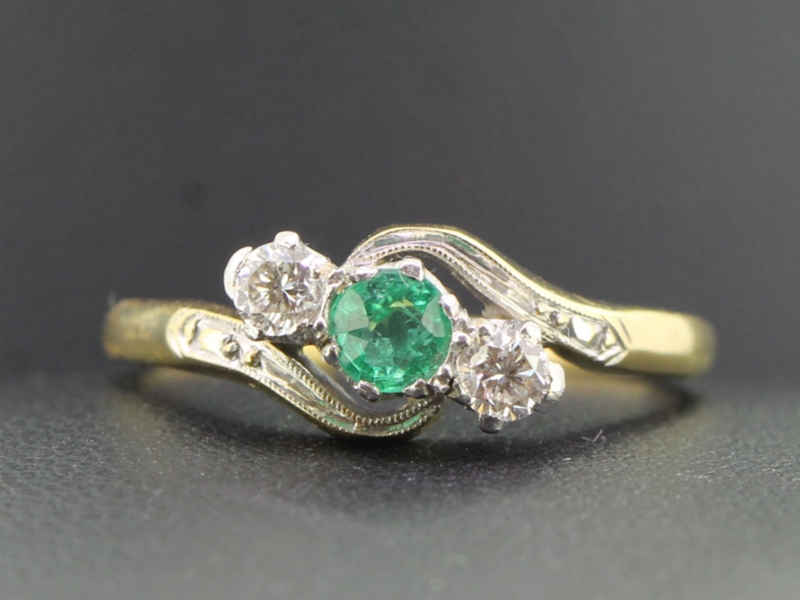 Beautiful emerald and diamond 18 carat gold and platinum ring
