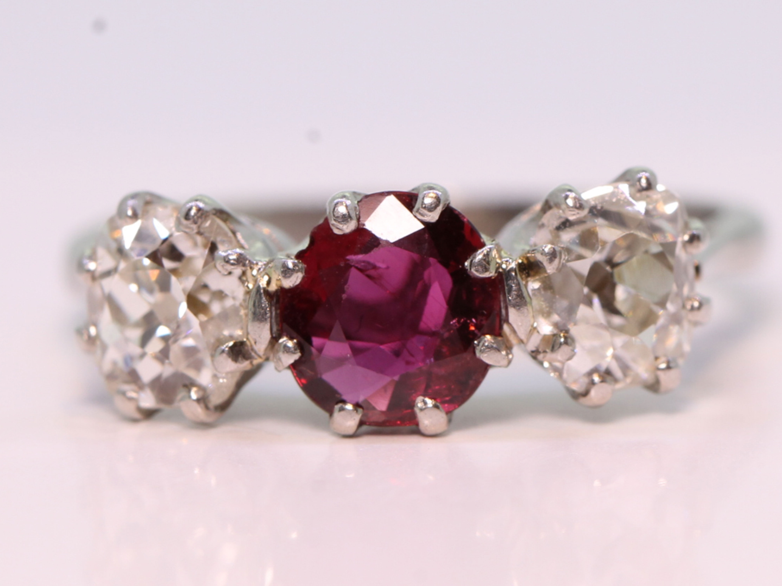 Art deco ruby and diamond platinum trilogy ring  