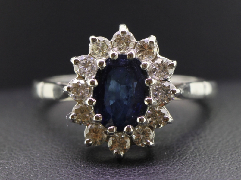 Classic sapphire and diamond cluster 18 carat gold ring