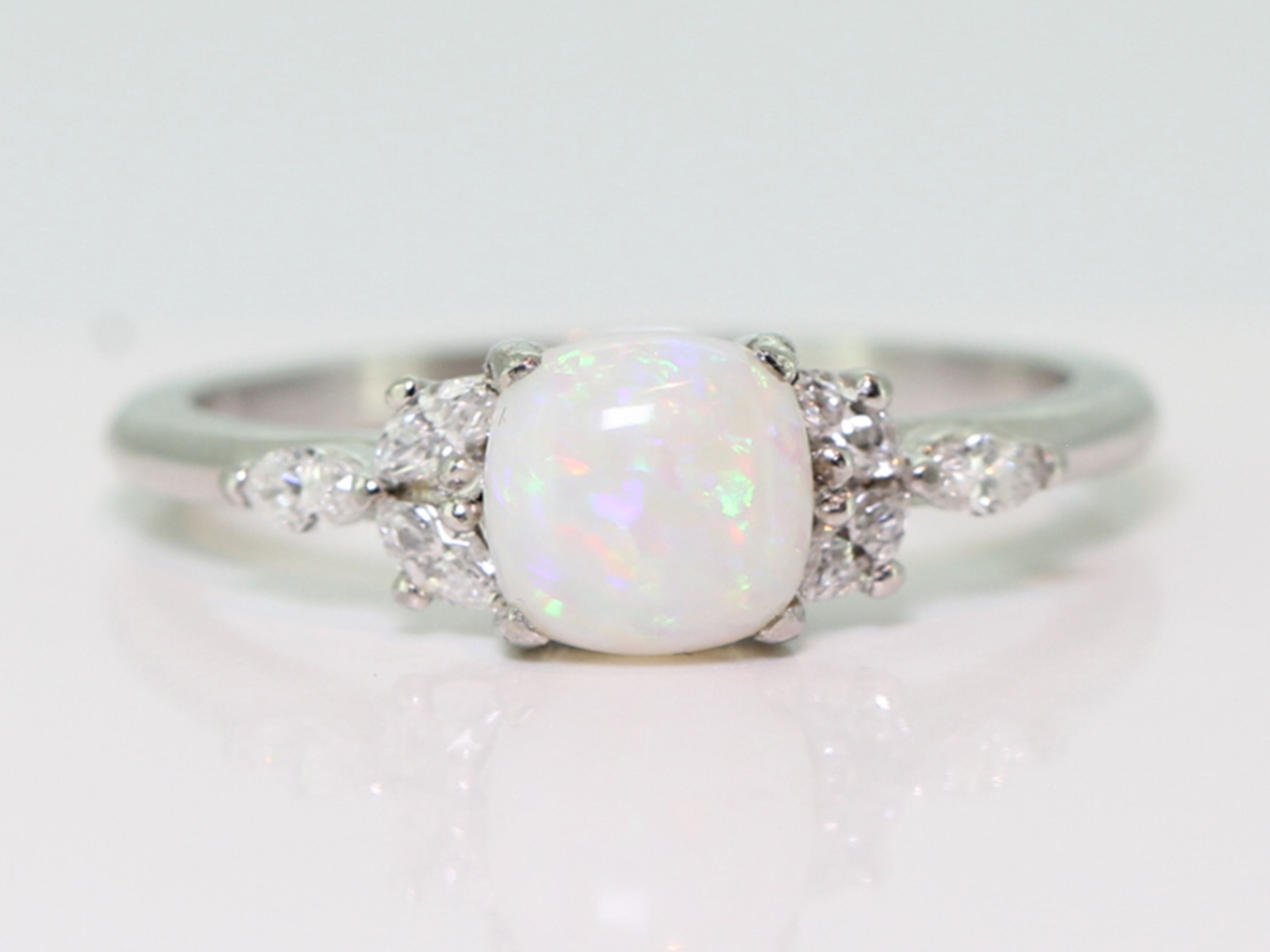 Beautiful opal and diamond floral platinum ring