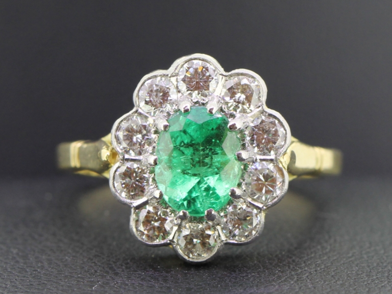 Stunning emerald and diamond 18 carat gold cluster ring