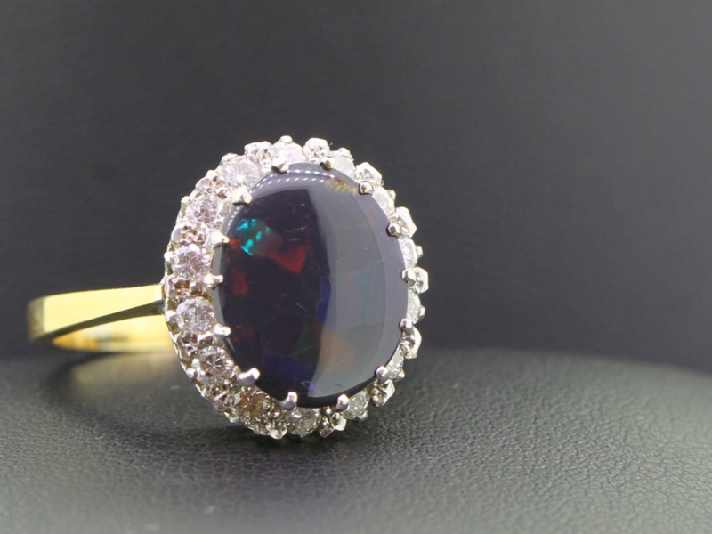  spectacular opal and diamond cluster 18 carat gold ring