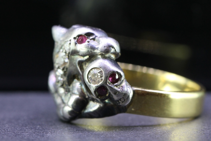 Stunning griffin and skull silver and 18 carat gold ring
