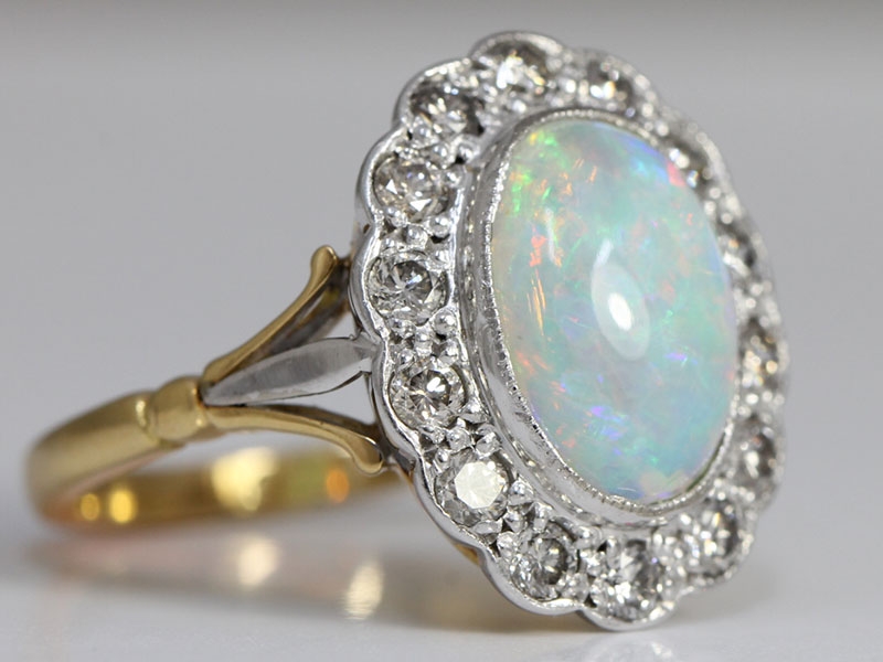 alluring opal and diamond 18 carat gold cluster ring