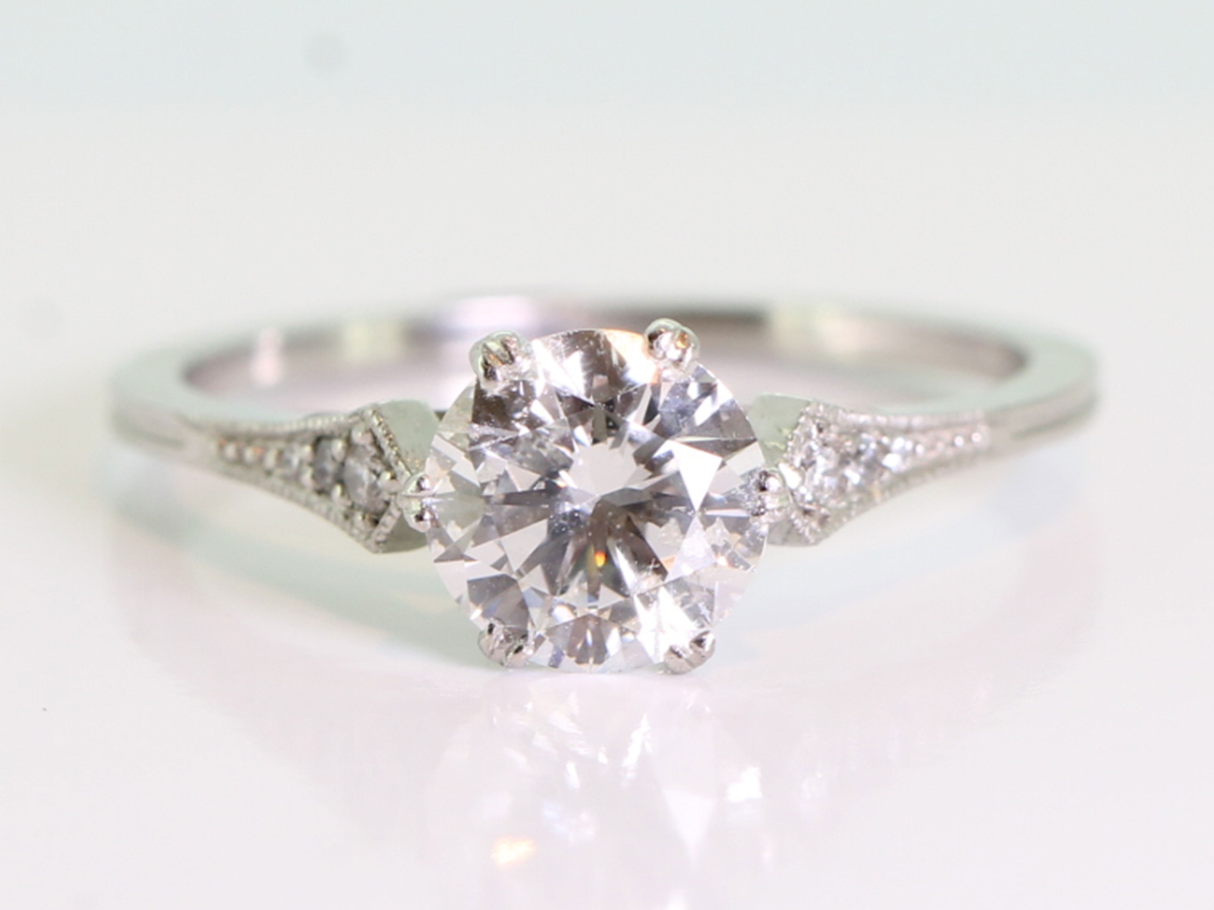 Elegant art deco style diamond solitaire platinum ring