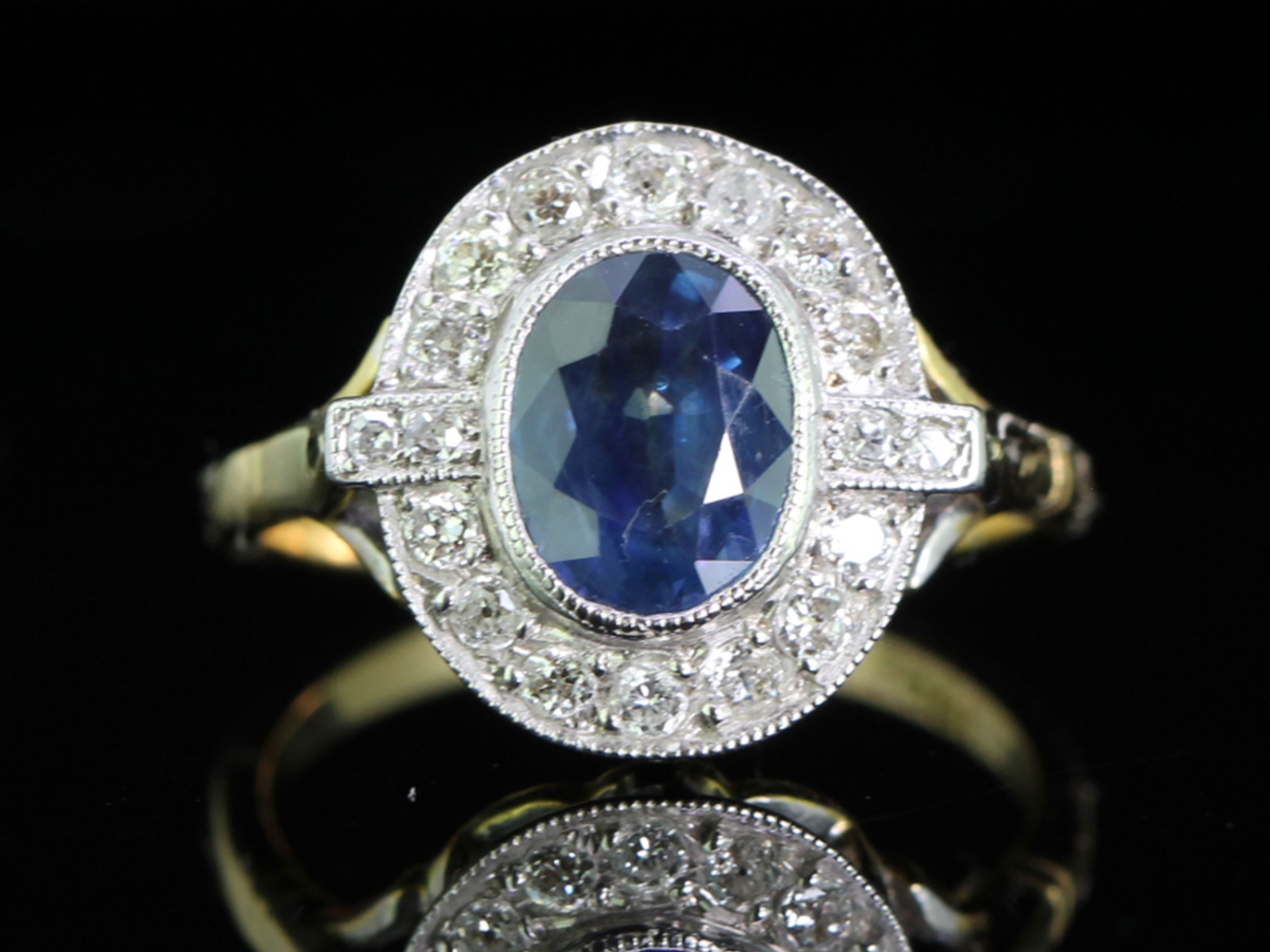 Gorgeous sapphire and diamond 18 carat gold cluster ring