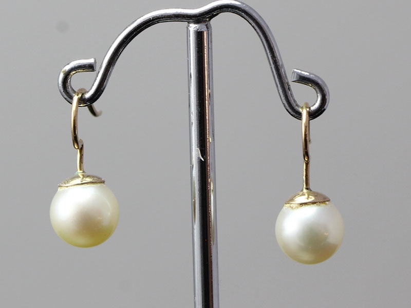 Opulent pearl and gold drop earrings