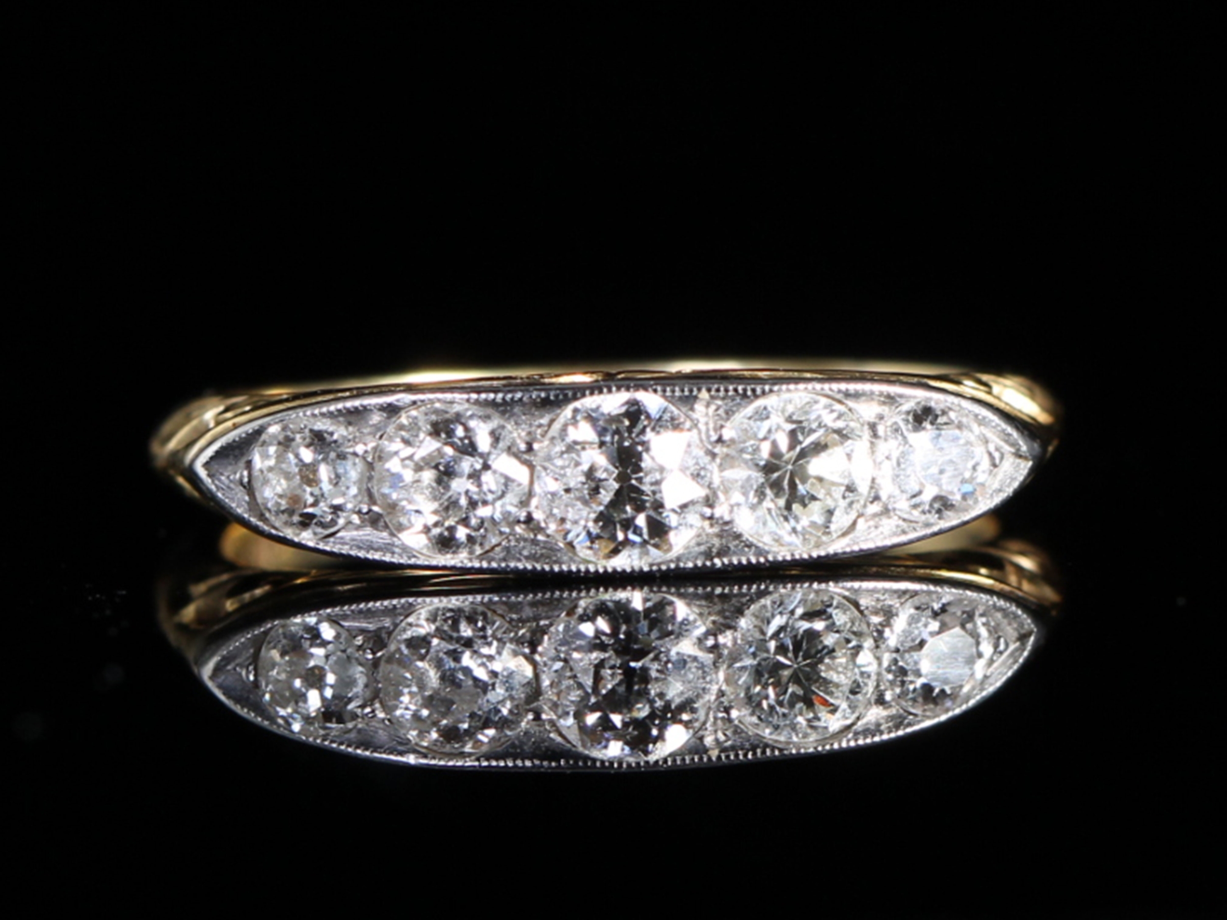 Edwardian carved half hoop five stone diamond ring