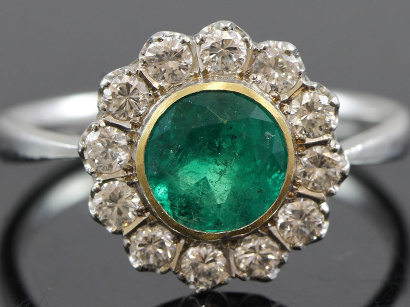 Fabulous colombian emerald and diamond platinum gold cluster ring