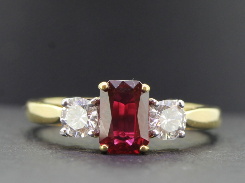 Stunning ruby and diamond 18 carat gold trilogy ring  