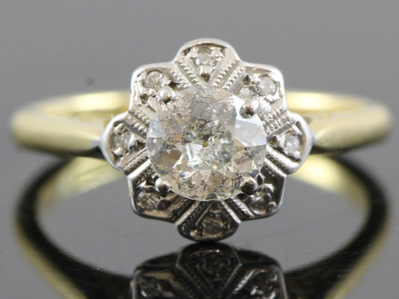  stunning diamond cluster platinum and 18 carat gold ring