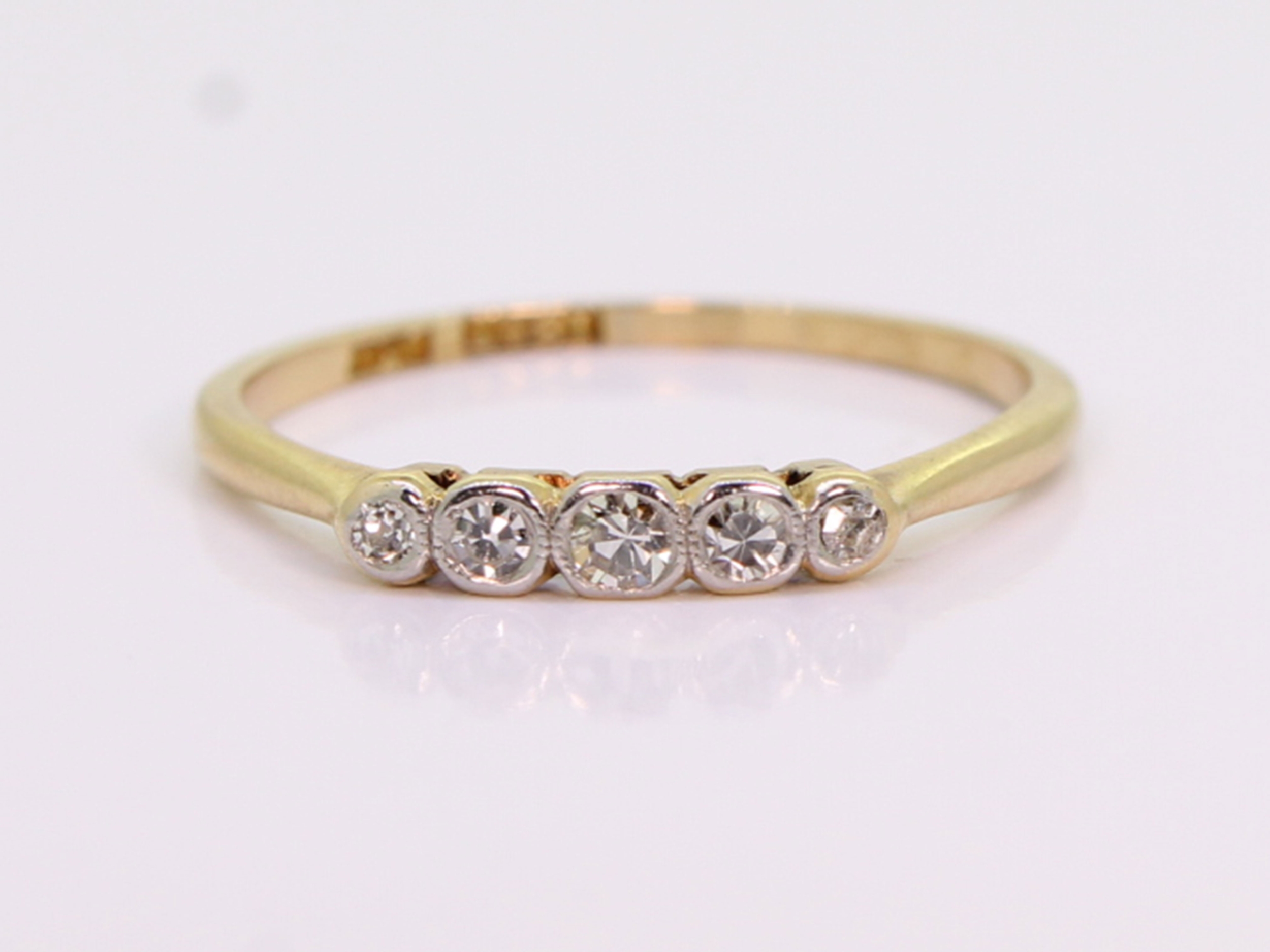 Edwardian five stone diamond 18ct gold ring