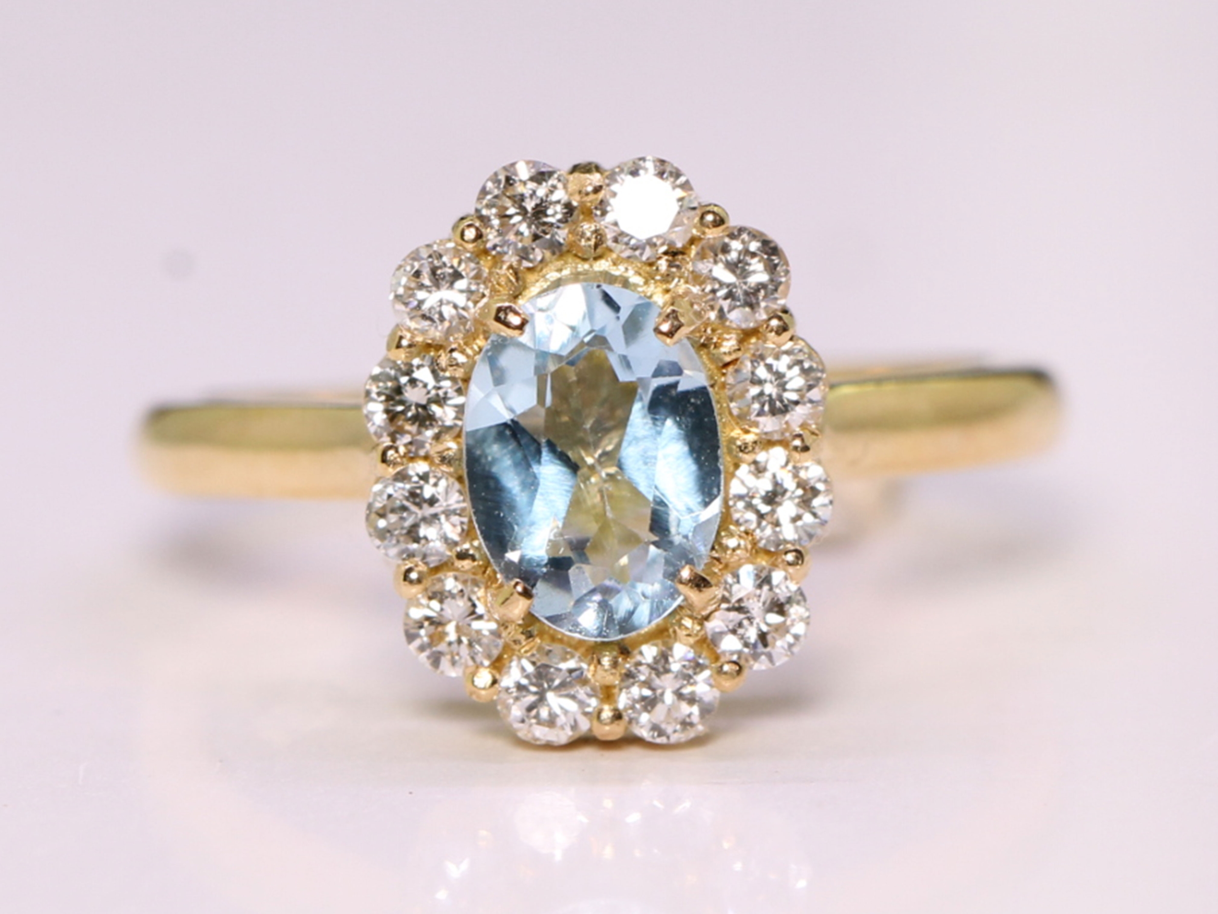 Vintage aquamarine and diamond 18ct gold oval cluster ring