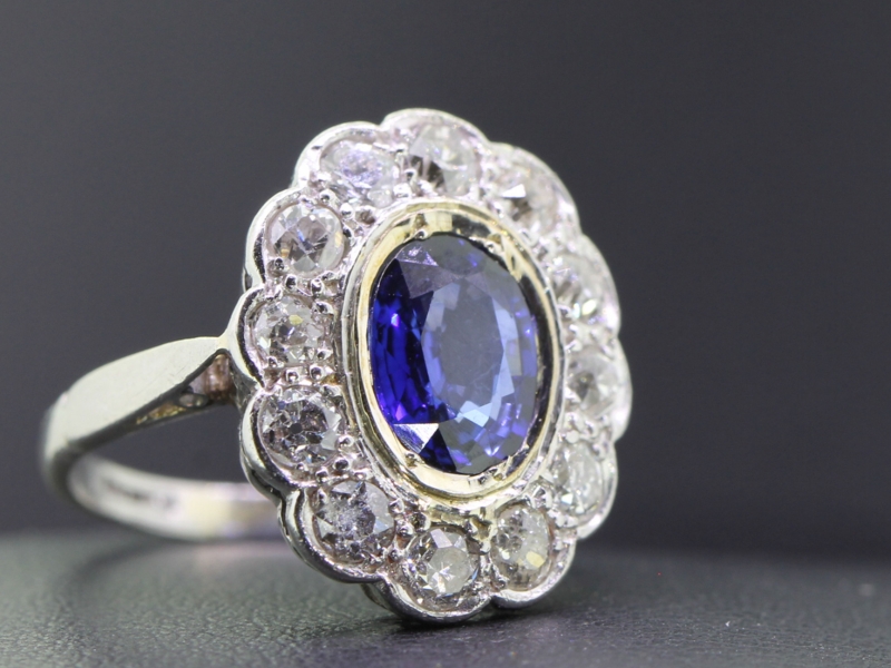 Stunning sapphire and diamond platinum cluster ring