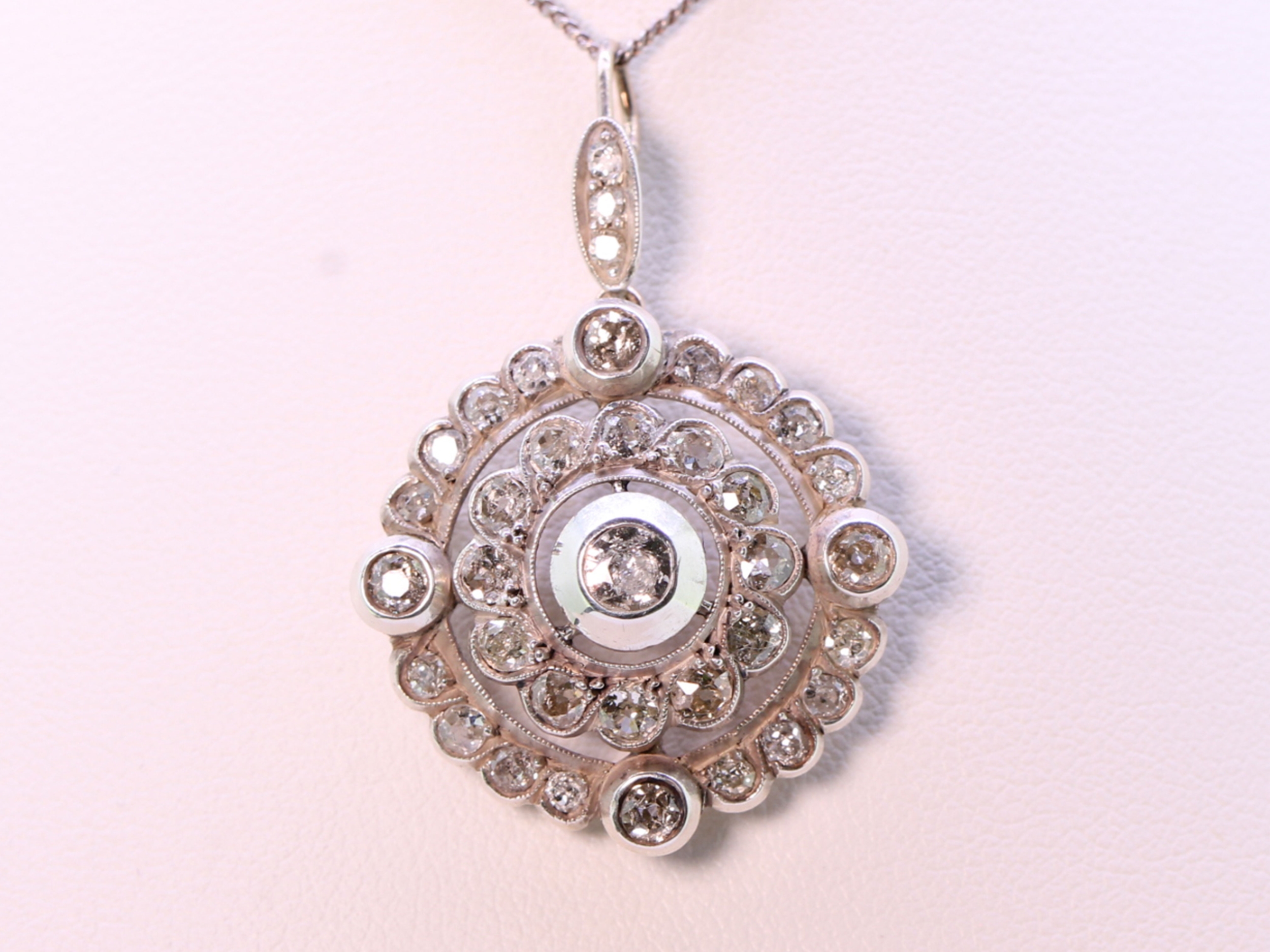 Victorian diamond set circular silver/gold pendant