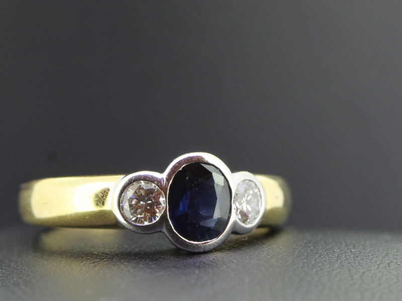 Wonderful sapphire and diamond rub over 18 carat gold ring
