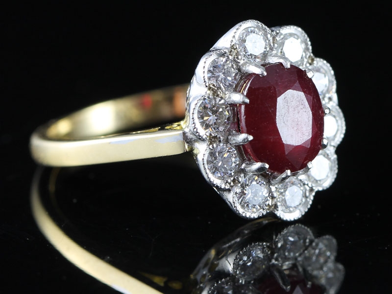 Sensational ruby and diamond cluster 18 carat gold ring