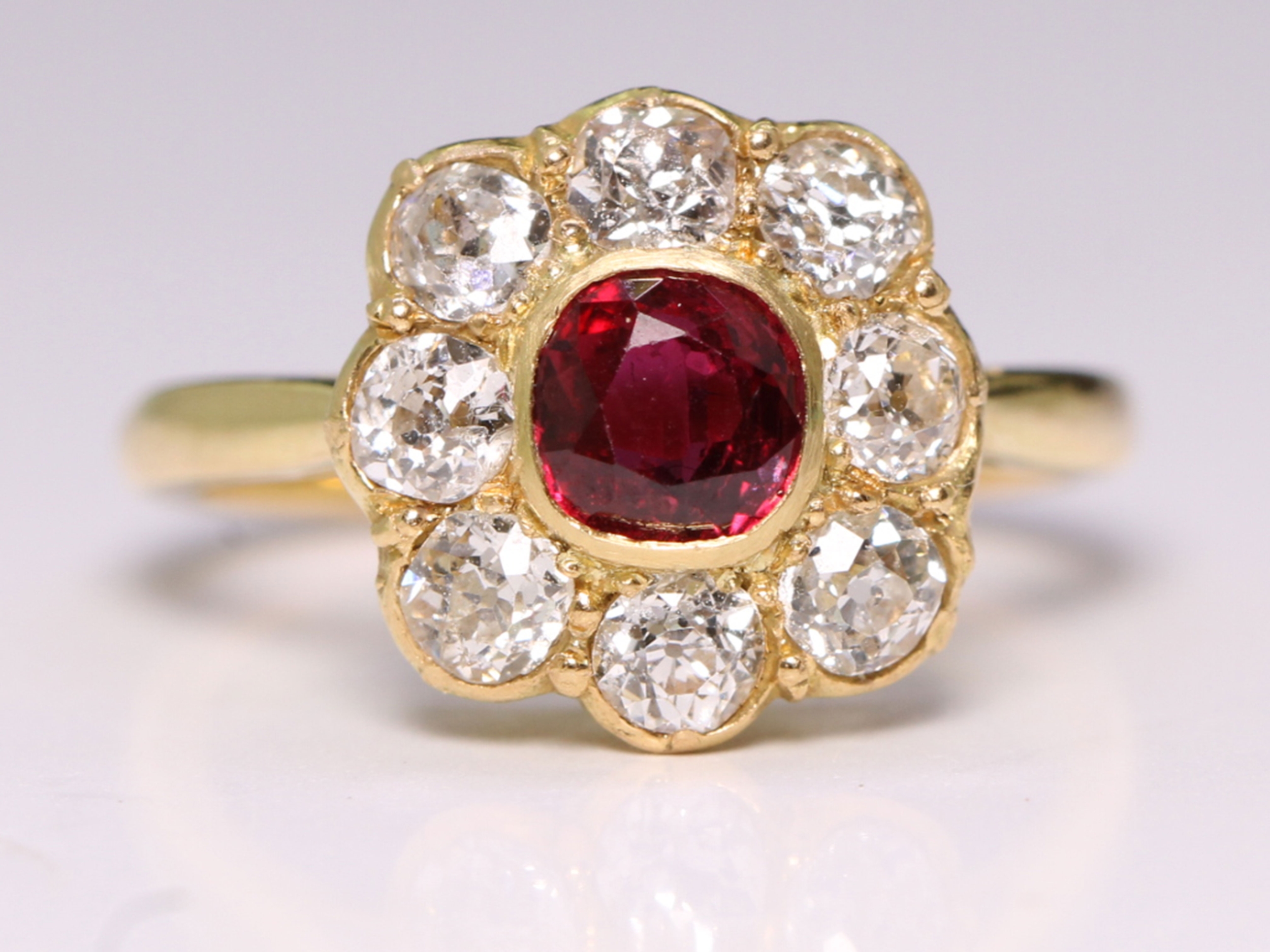 Vintage ruby and diamond 18ct gold cluster ring