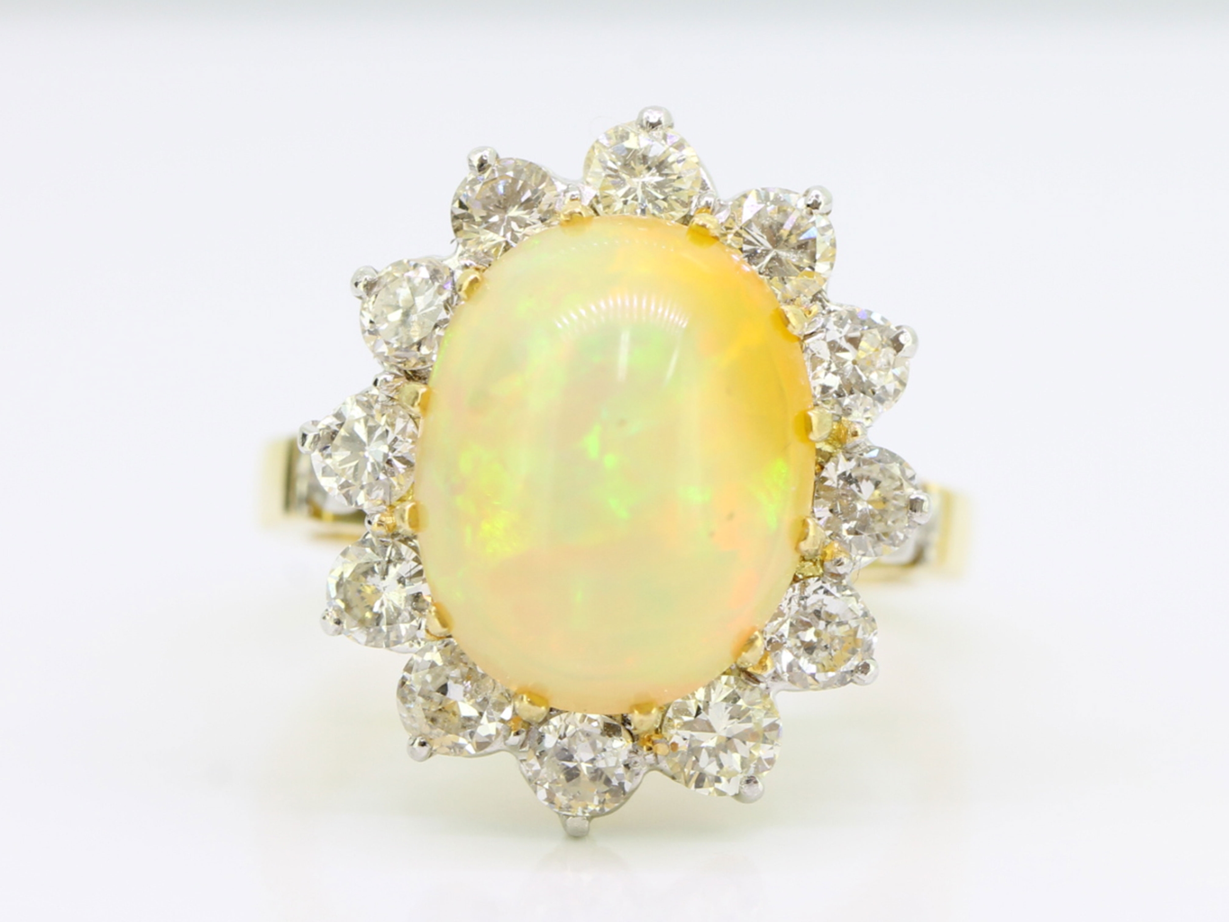 Stunning opal and diamond 18 carat gold cluster ring