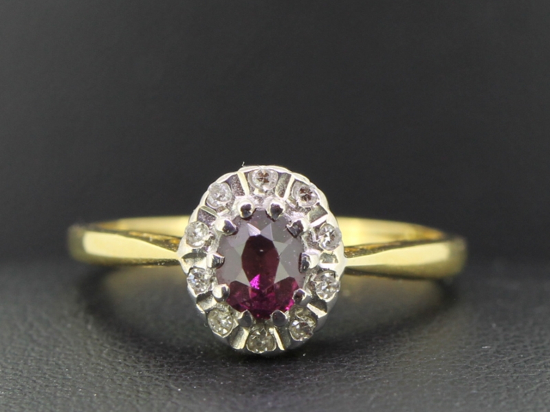 Beautiful ruby and diamond cluster 18 carat gold ring