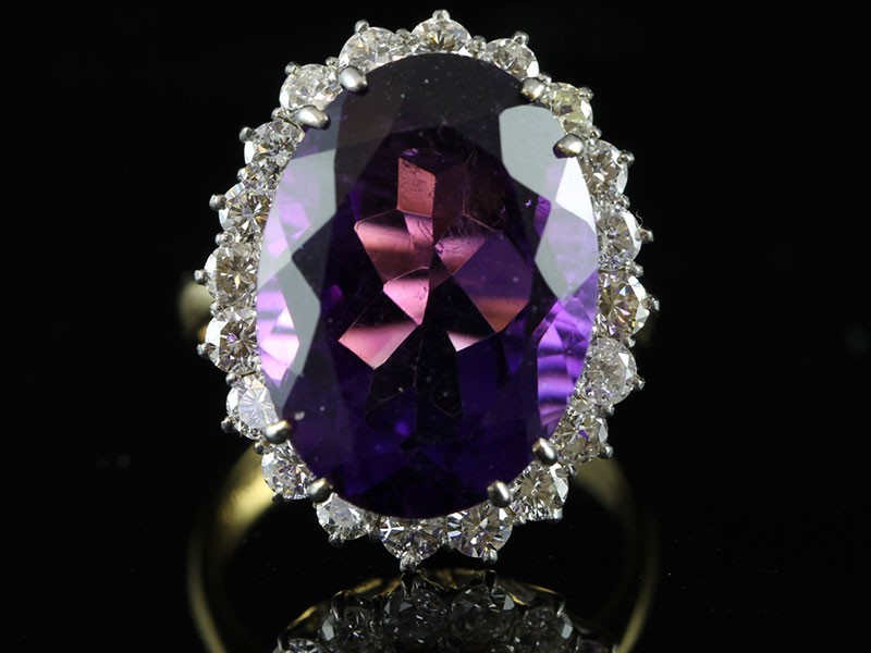 Magnificient amethyst and diamond 18 carat gold cluster ring