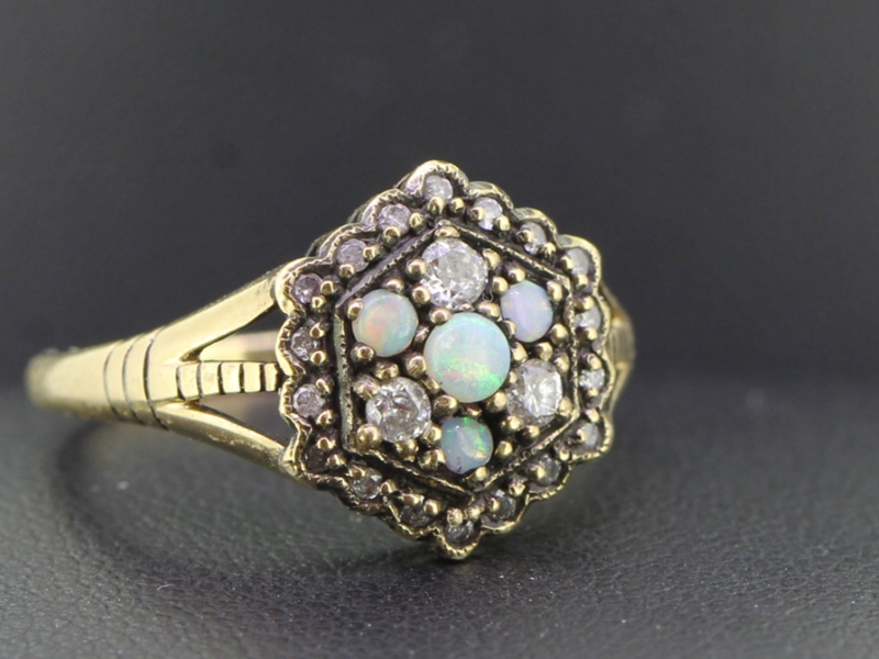 Lovely opal and diamond 9 carat gold cocktail ring