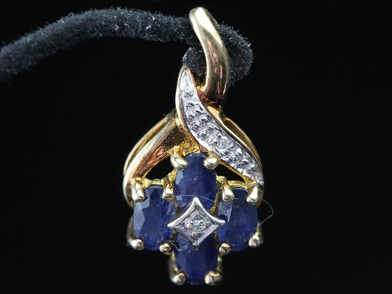 Glamourous sapphire and diamond 9 carat gold pendant