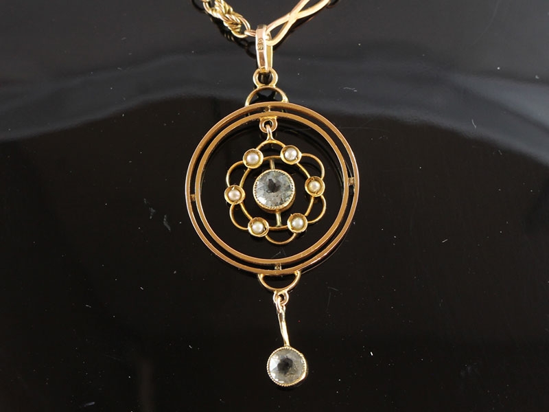 Elegant aquamarine and seed pearl 9 carat gold pendant and chain