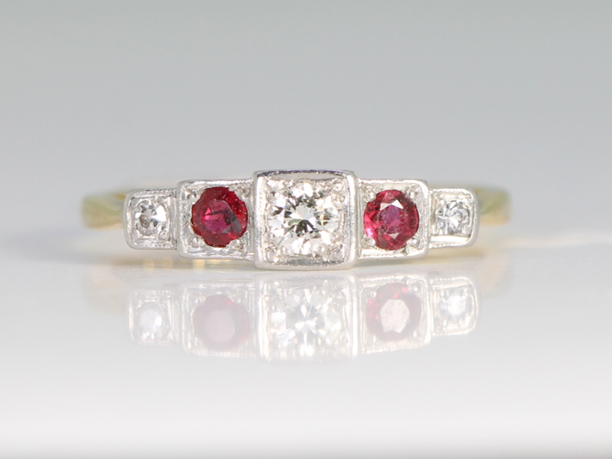 Art deco ruby and diamond platinum and 18ct gold ring