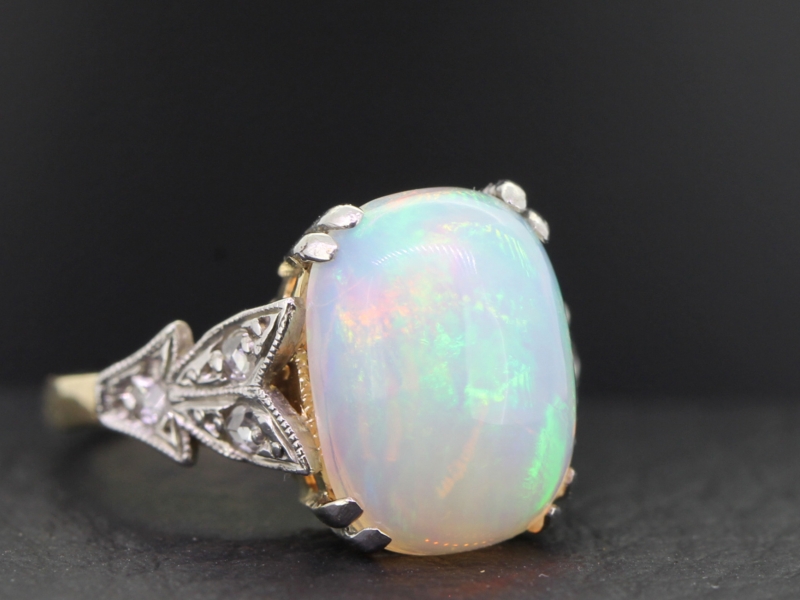 Stunning opal and diamond 18 carat gold and platinum ring