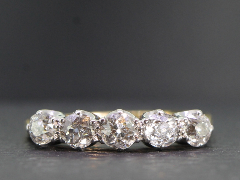 Beautiful five stone diamond 18 carat gold ring