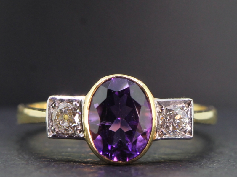 Elegant amethyst and diamond 18 carat gold trilogy ring 