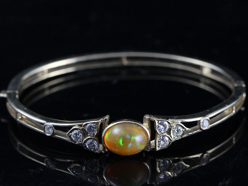 Exceptional opal and diamond 9 carat gold bangle
