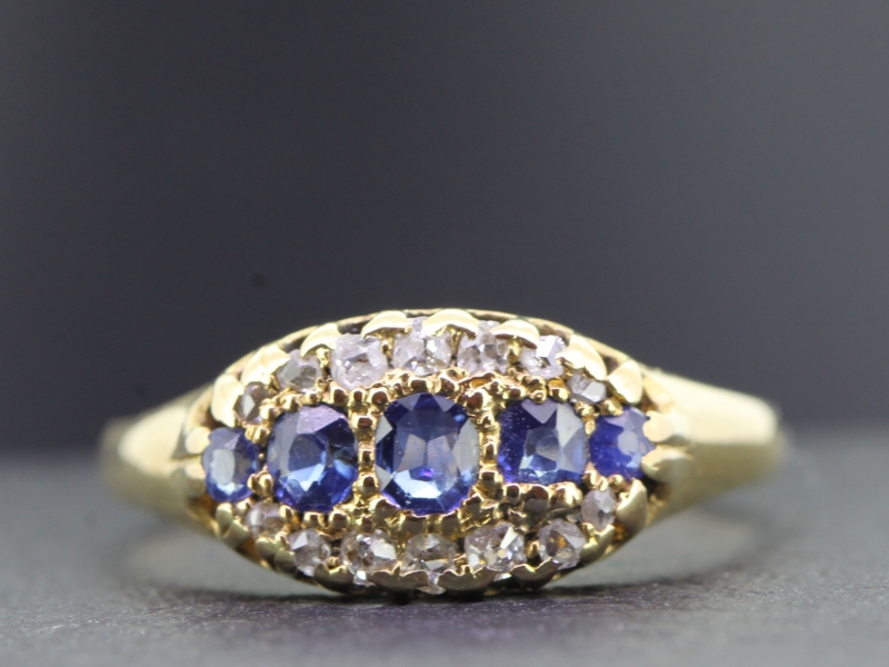 Wonderful sapphire and diamond 18 carat gold gypsy ring