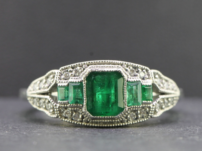 Beautiful art deco inspired colombian emerald and diamond platinum ring