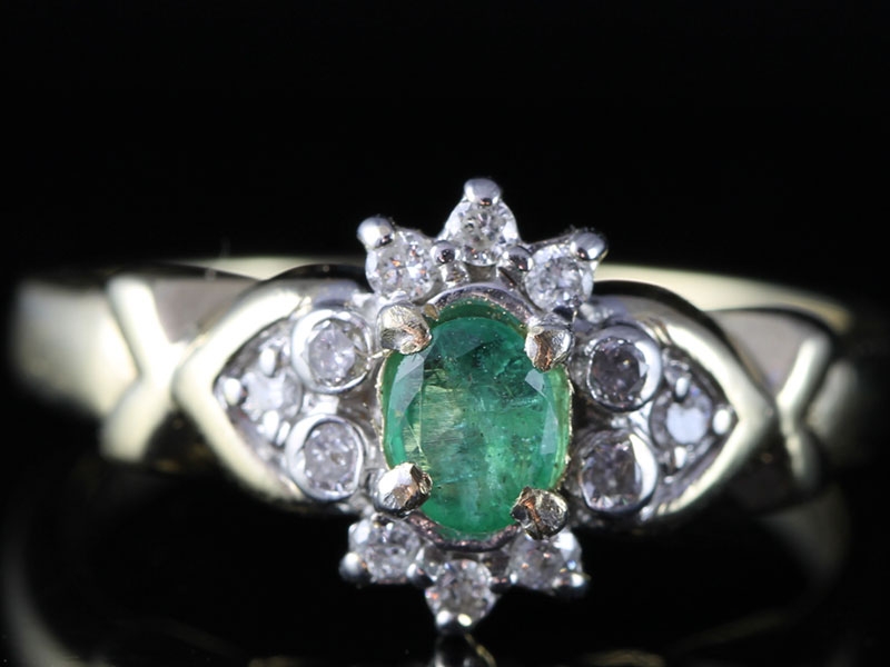 Devine emerald and diamond cluster 9 carat gold ring