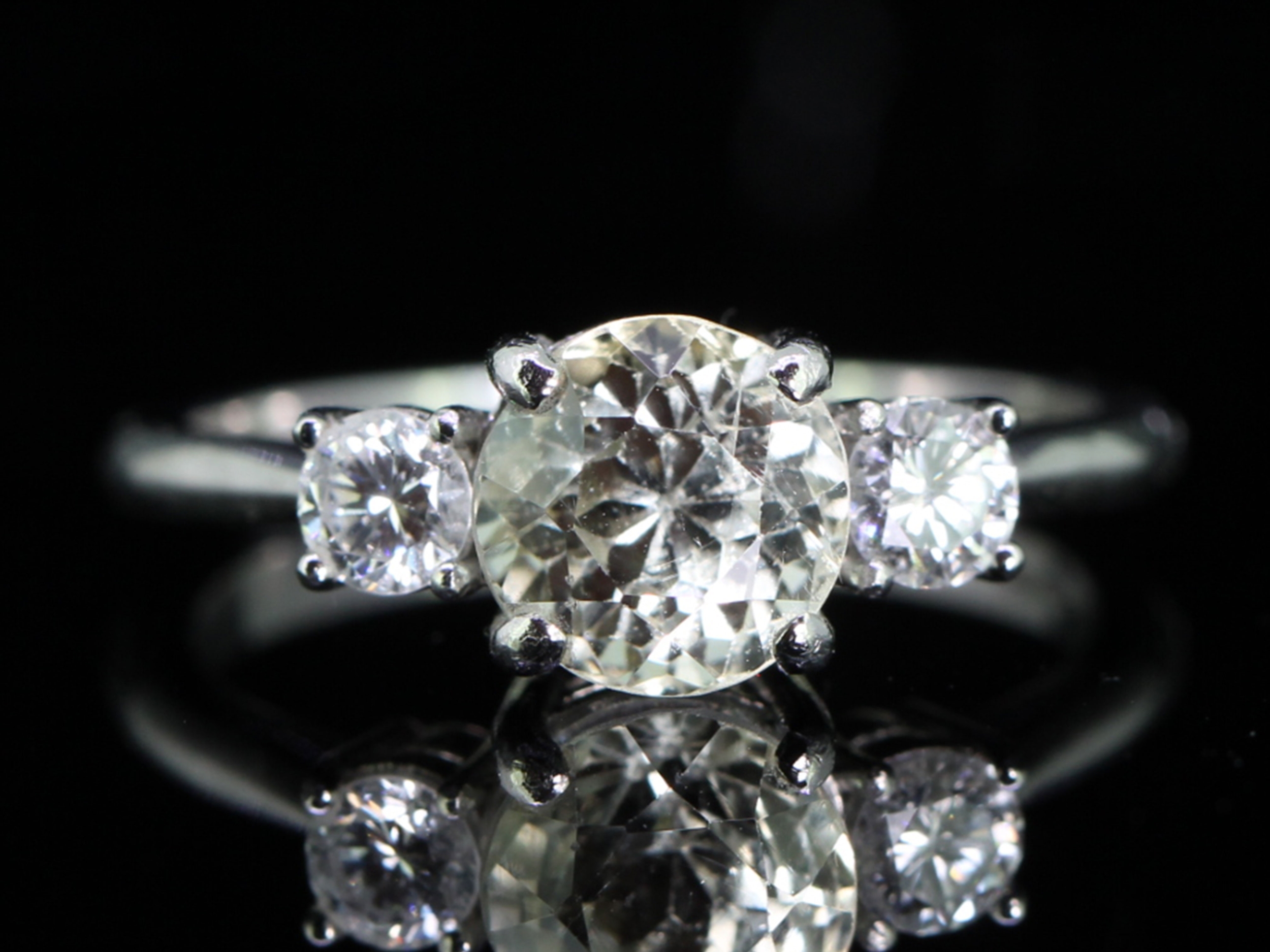 Stunning natural yellow sapphire and diamond platinum trilogy ring