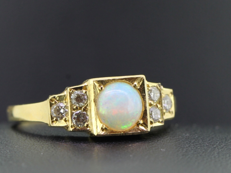 Fabulous opal and diamond 18 carat gold ring