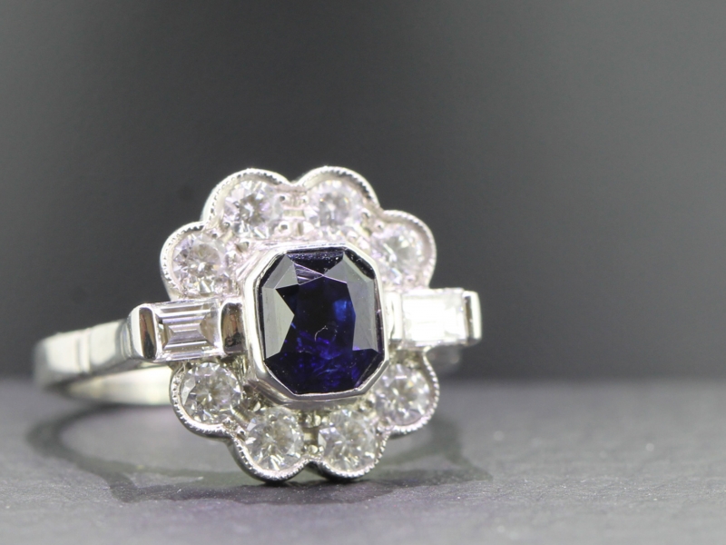 Stunning ceylon sapphire and diamond platinum cluster ring