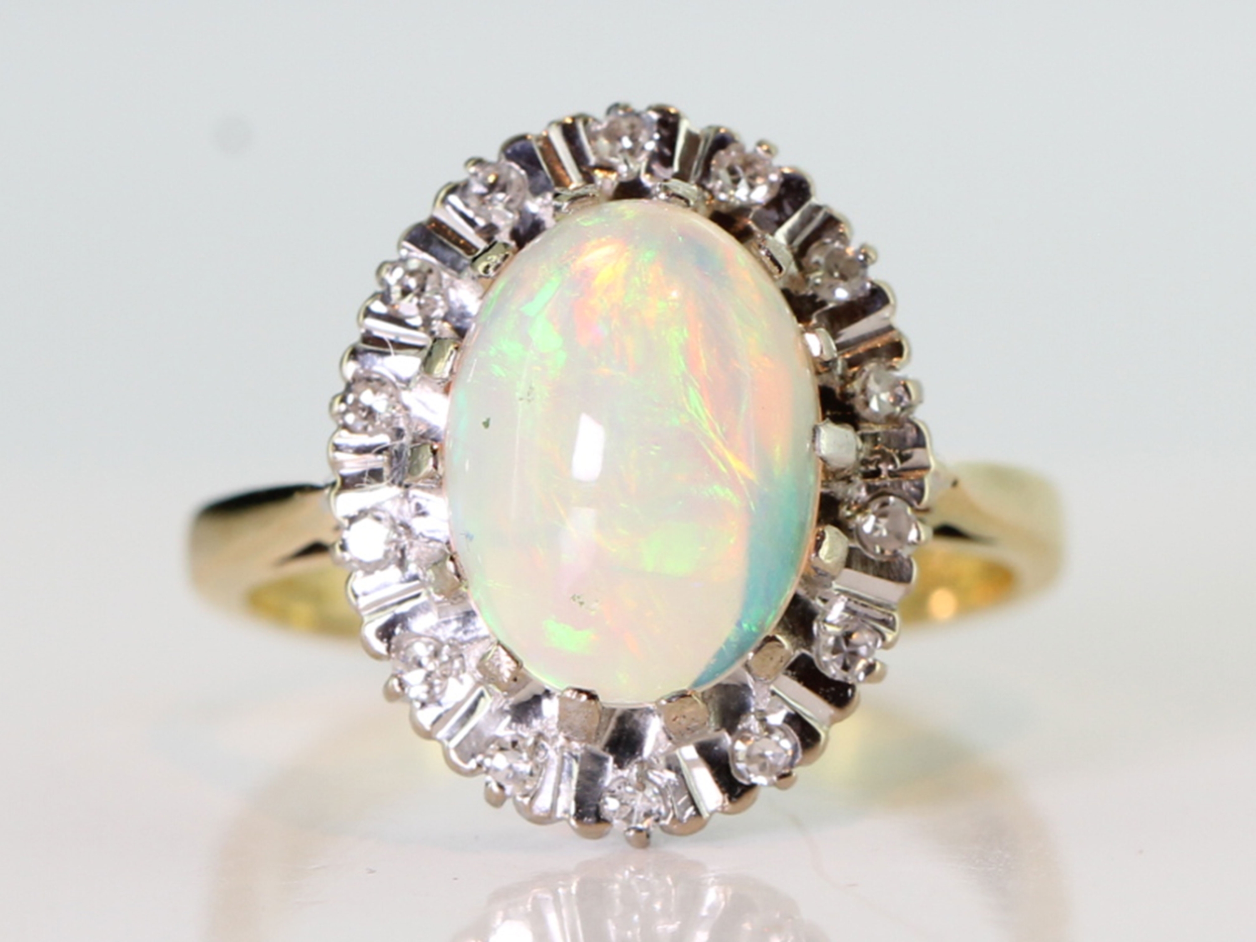 Wonderful 1940s opal and diamond 18 carat gold cluster ring